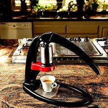 Image of the Flair Espresso Maker with a sleek manual press design, featuring a detachable stainless steel brewing head and a durable aluminum press stand, perfect for home espresso crafting. 