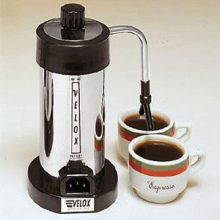 Velox Electric Espresso Maker with stainless steel containers and automatic espresso dispensing system. 
