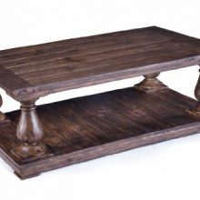 Densbury Natural Pine Cocktail Table with rustic charm, turning legs, and back base shelf, showcasing a distressed pine finish. 