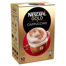 A close-up of Nescafé Cappuccino Sticks showing a rich, creamy cappuccino with a thick milk foam layer in a cup. 
