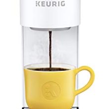 Keurig K-Mini Plus Coffee Maker in matte white with integrated pod storage and removable drip tray, designed for travel mugs and quick, strong brews.