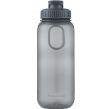 A stylish Rubbermaid Thermal Bottle in Bordeaux finish, filled with steaming coffee, placed on a desk with a cozy backdrop. 