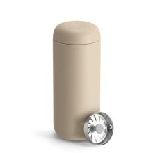 Fellow Carter Move 16oz Travel Mug in Sand Dune color, showcasing its vacuum-insulated stainless steel body, ceramic interior, and slide-lock lid