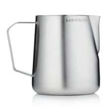 Brushed steel stainless steel milk frothing jug with measuring marks, ergonomic handle, and precision pour spout, perfect for creating latte art and serving coffee