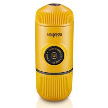 Close-up of the WACACO Nanopresso Portable Espresso Maker in yellow, showcasing its compact design and manual operation, ideal for outdoor use