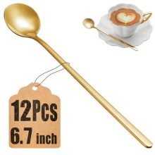 Elegant set of 12 gold coffee spoons with long handles, perfect for stirring coffee and tea, displayed on a modern kitchen table.