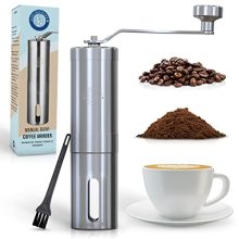 Manual coffee grinder with stainless steel construction, ceramic burr, and adjustable coarseness knob, featuring a handheld design and included cleaning brush.