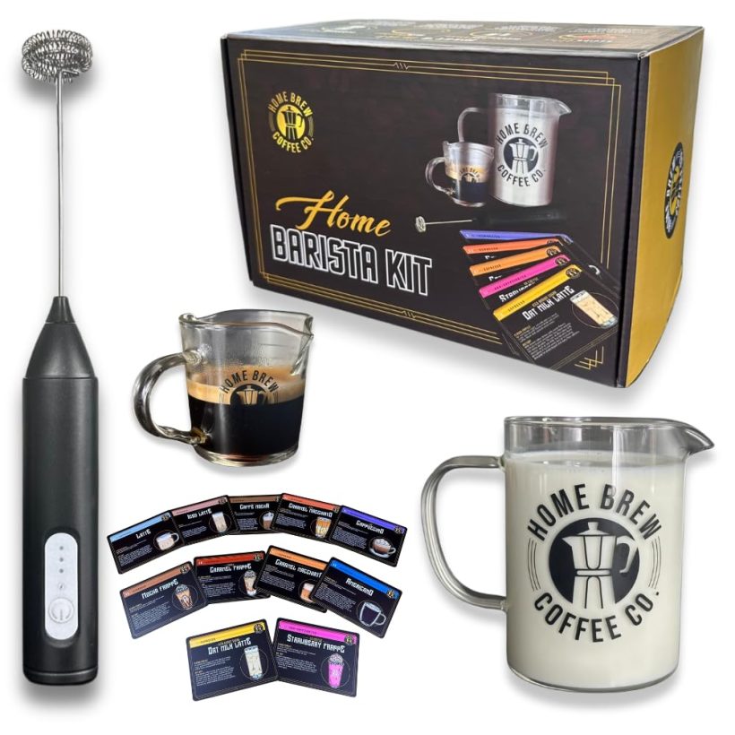 Complete Home Barista Kit with rechargeable milk frother, recipe cards, measuring glass, and frothing pitcher, all set for making café-quality drinks at home.