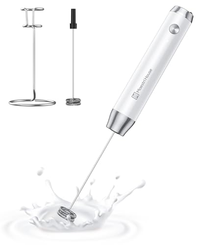 Rechargeable handheld milk frother with detachable stainless steel whisk and a sleek storage stand, perfect for frothing lattes and mixing protein shakes.