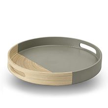 Elegant hand-crafted round bamboo serving tray with handles, featuring a semi-grey finish and concentric circle patterns, perfect for coffee table or dining use.