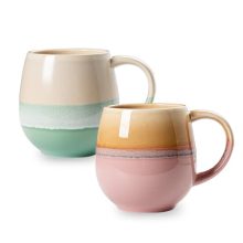 Set of 2 large ceramic coffee mugs with unique reactive glaze and large handles, ideal for hot beverages like coffee and tea, displayed on a stylish kitchen counter.