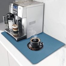 Blue 19x12 coffee maker mat with non-slip rubber backing and absorbent 3-layer construction, ideal for keeping kitchen counters clean and dry