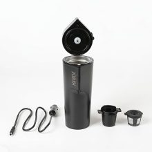 Compact 12V travel coffee maker with single cup capacity, compatible with K-Cups and ground coffee, featuring a rechargeable design and multiple power options.