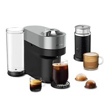 Nespresso Vertuo Pop+ Deluxe coffee and espresso machine in silver, featuring a compact design with a removable water tank, and accompanied by the AeroCCINO3 milk frother for creating hot and cold milk foam.