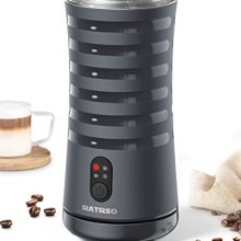 Elegant 4-in-1 Electric Milk Frother with Eiffel Tower-inspired design, showcasing its sleek shape, LED indicators, and one-button control for easy milk frothing and heating.