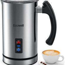 Silver automatic milk frother and steamer with stainless steel finish, shown frothing milk for coffee, featuring a sleek design, ergonomic spout, and easy-to-clean surface.