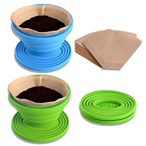 Set of two collapsible silicone pour-over coffee drippers in black, with included paper filters, showcasing compact and portable design ideal for home, camping, and travel use. 