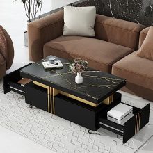 Modern black coffee table with faux marble top, featuring two spacious drawers and gold metal bars, designed with caster wheels for easy mobility, ideal for living rooms, offices, and studies.