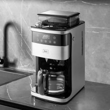 Melitta® Aroma Fresh™ Plus 10-Cup Programmable Coffee Maker with built-in grinder, large bean hopper, removable water tank, and sleek brushed stainless steel design