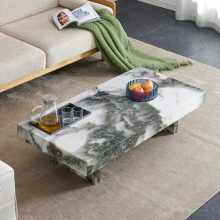 White faux marble coffee table with stainless steel legs and storage shelf, perfect for modern living rooms or office spaces.