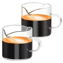 Clear glass espresso cups with dual spouts and ergonomic handles, ideal for serving coffee, milk, or desserts, in a stylish and functional design