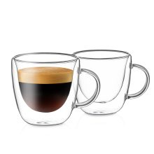 Set of two 4oz Red Rocks double-walled clear glass espresso cups with ergonomic handles, featuring an elegant floating effect and thermal insulation for maintaining beverage temperature.