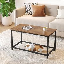 Small rectangular coffee table with dark walnut finish, featuring a minimalist design and metal frame, ideal for compact spaces and modern interiors.