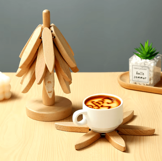 Wooden heat-resistant table mats with a decorative tree design, perfect for protecting surfaces from hot pots while adding a natural aesthetic to any dining space.