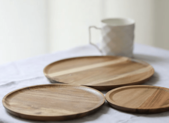 Elegant Japanese acacia wood coffee tray displayed with desserts and decorative items, showcasing its versatility and stylish design.