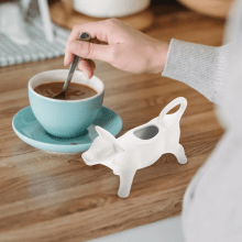 Stylish white ceramic milk pitcher, perfect for serving cream, sauces, and more.