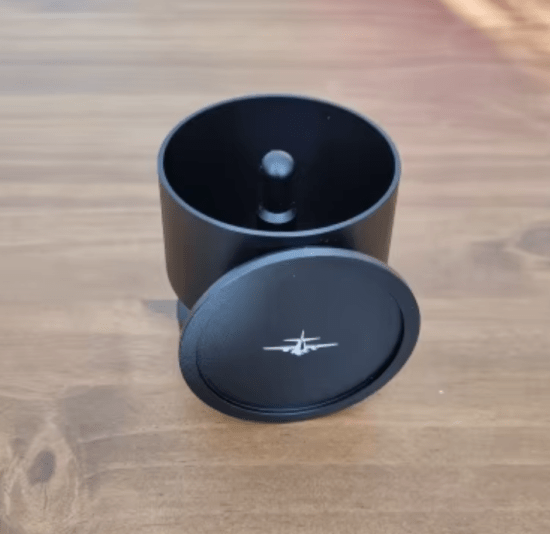 MHW-3BOMBER Coffee Dosing Funnel made of food-grade aluminum, showcasing its hollow bottom design and matching top cover for efficient espresso preparation.